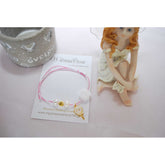 Μαρτυρικό βραχιόλι με γλειφιτζούρι σε ροζ παλ αποχρώσεις