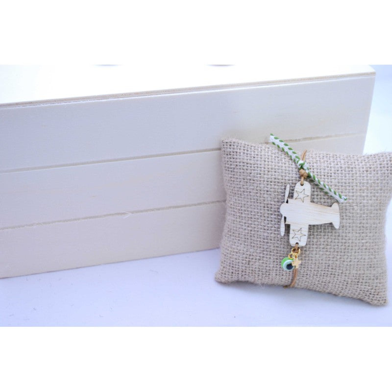 Μαρτυρικό βραχιόλι με ξύλινο αεροπλανάκι , ματάκι και σταυρό μεταλλικό