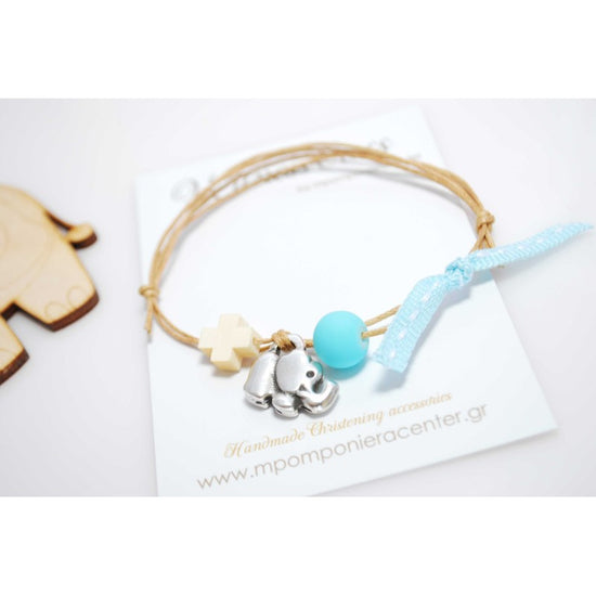 Μαρτυρικό βραχιόλι με διπλό κορδόνι , ξύλινο σταυρό και μεταλλικό ελεφαντάκι