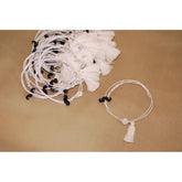 Μαρτυρικό βραχιόλι με μουστάκι σε μαύρο, λευκό σταυρό, λευκό κορδόνι & φούντα λευκή