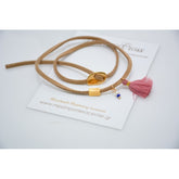 Μαρτυρικό βραχιόλι με ιδιαίτερο σουέντ κορδόνι , περαστό σταυρό και κούμπωμα, φουντίτσα και πέρλα