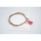 Μαρτυρικό βραχιόλι με ιδιαίτερο σουέντ κορδόνι , περαστό σταυρό και κούμπωμα, φουντίτσα και πέρλα