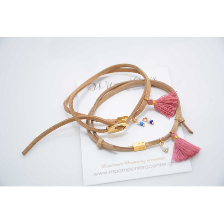 Μαρτυρικό βραχιόλι με ιδιαίτερο σουέντ κορδόνι , περαστό σταυρό και κούμπωμα, φουντίτσα και πέρλα