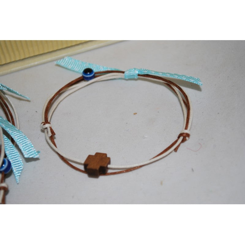 Μαρτυρικό βραχιόλι με σταυρό Μαρτυρικό βραχιόλι καφέ με σταυρό ξύλινο & ματάκι μπλε